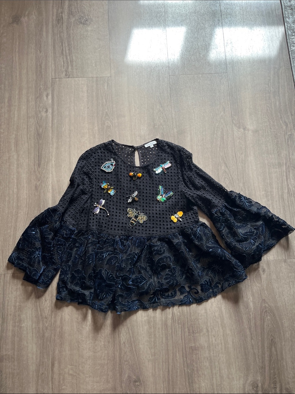 Adore Black Eyelet Peplum Top with Beaded Dragonfly Accent